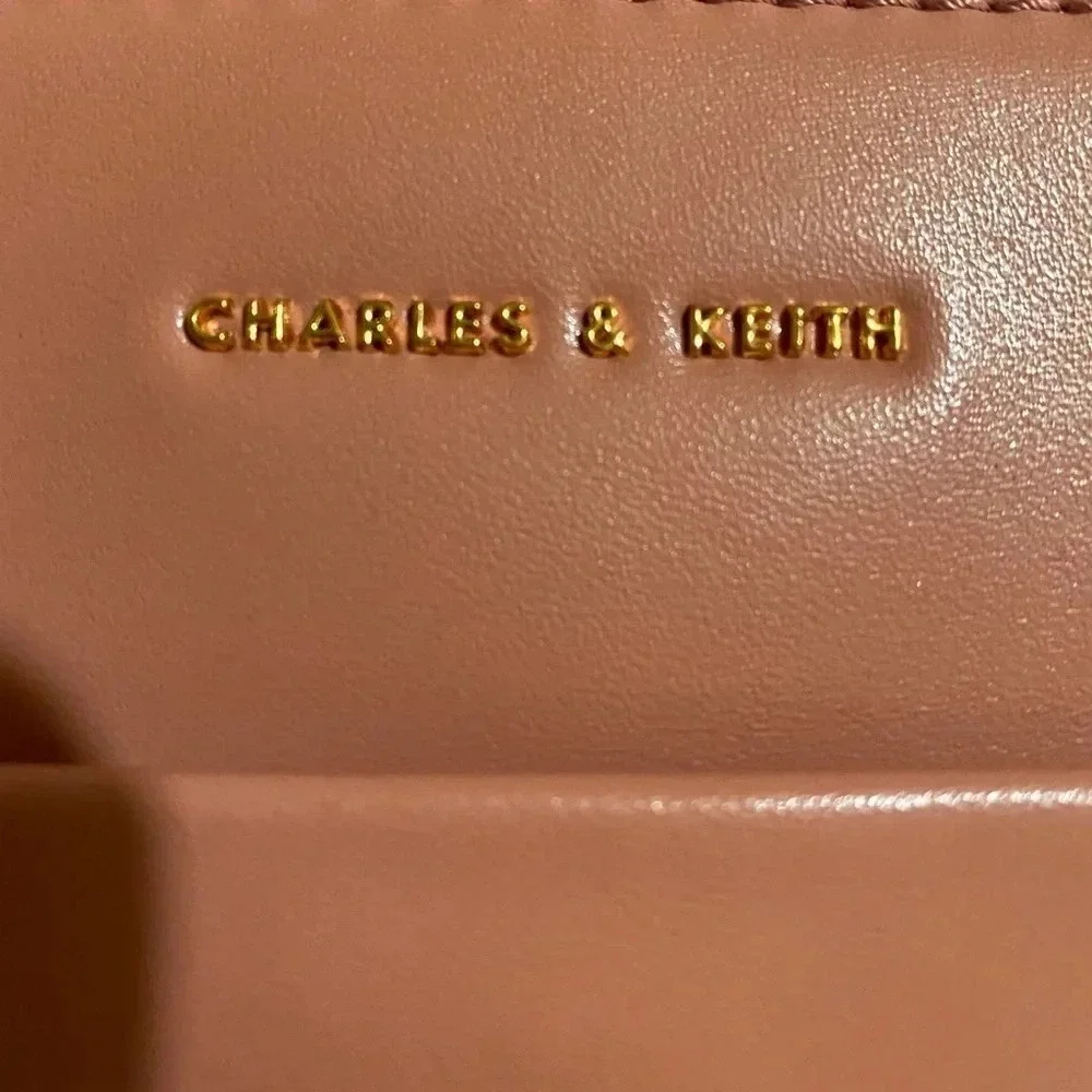 Charles & Keith pink poly crossbody handbag